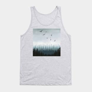 Cloudy or misty forest with pine trees and birds Tank Top